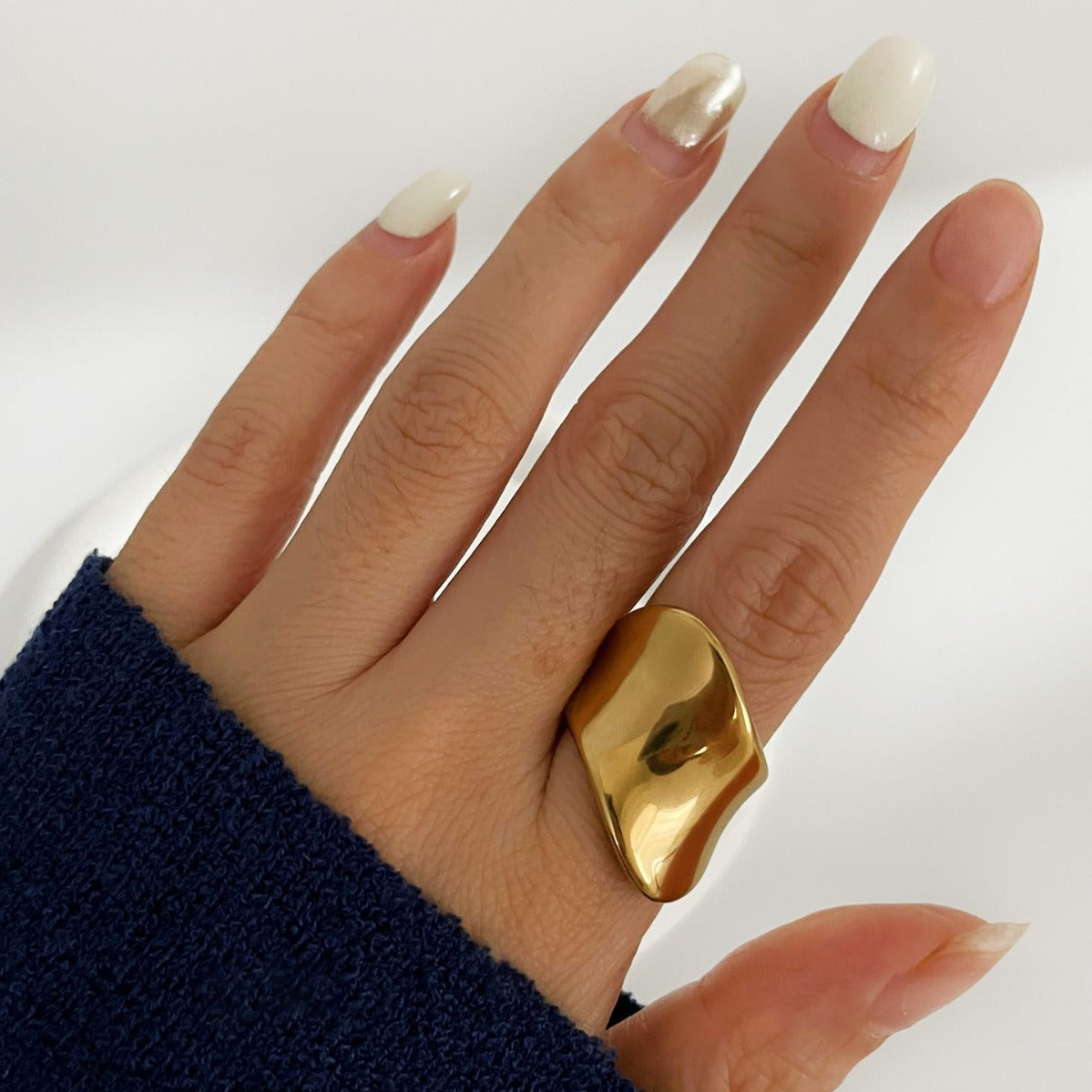 Fashionable and versatile titanium steel irregular large light surface 18K gold waterproof color preservation versatile ring for women